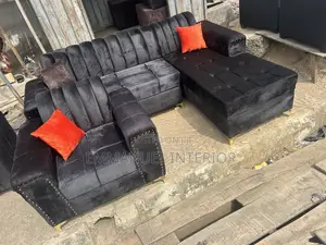 A Living Room Couch With Throw Pillow