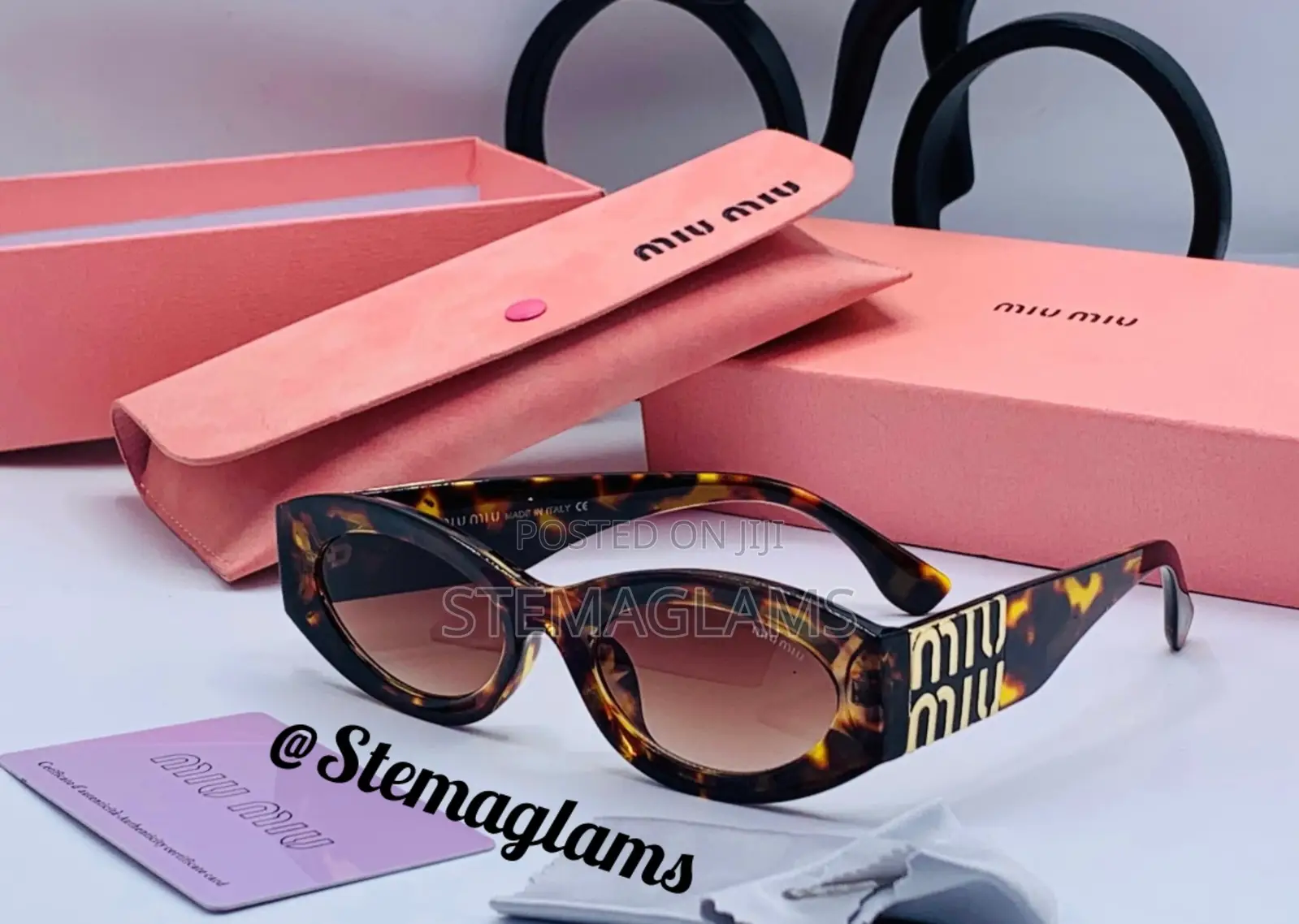 Miu Miu Rectangle Style Glasses