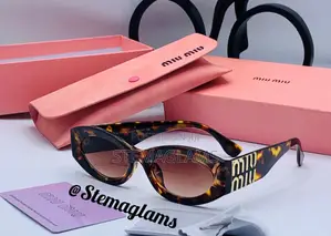 Miu Miu Rectangle Style Glasses