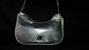 Photo - Metallic Silver Shoulder Bag With Planet Shaped Decor