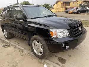 Photo - Toyota Highlander Limited V6 4x4 2004 Black