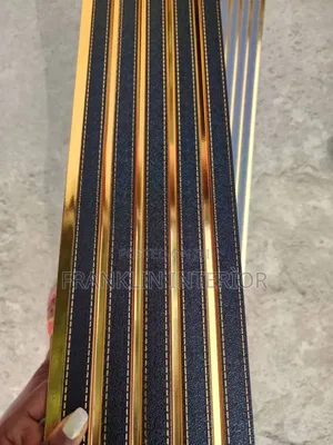 Check Out This Black and Gold Fluted Panel Design