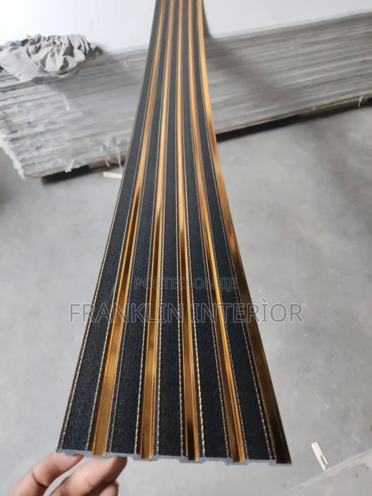 Check Out This Black and Gold Fluted Panel Design