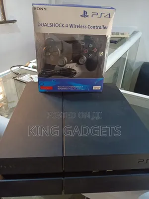 Photo - Ps4 With 10 Games and Pad With Accessoriescheap