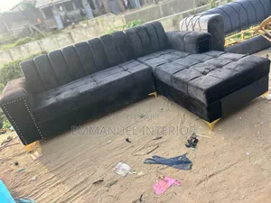 A Standard Black Velvet Sofa