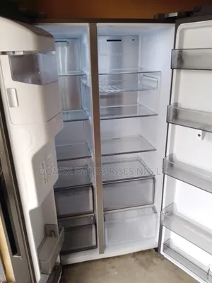 LG Side by Side With Tv and Dispenser
