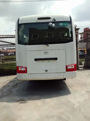 Photo - New Toyota Coaster 2023 White