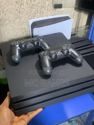 Used Ps4 Pro With Two Pads and 10games