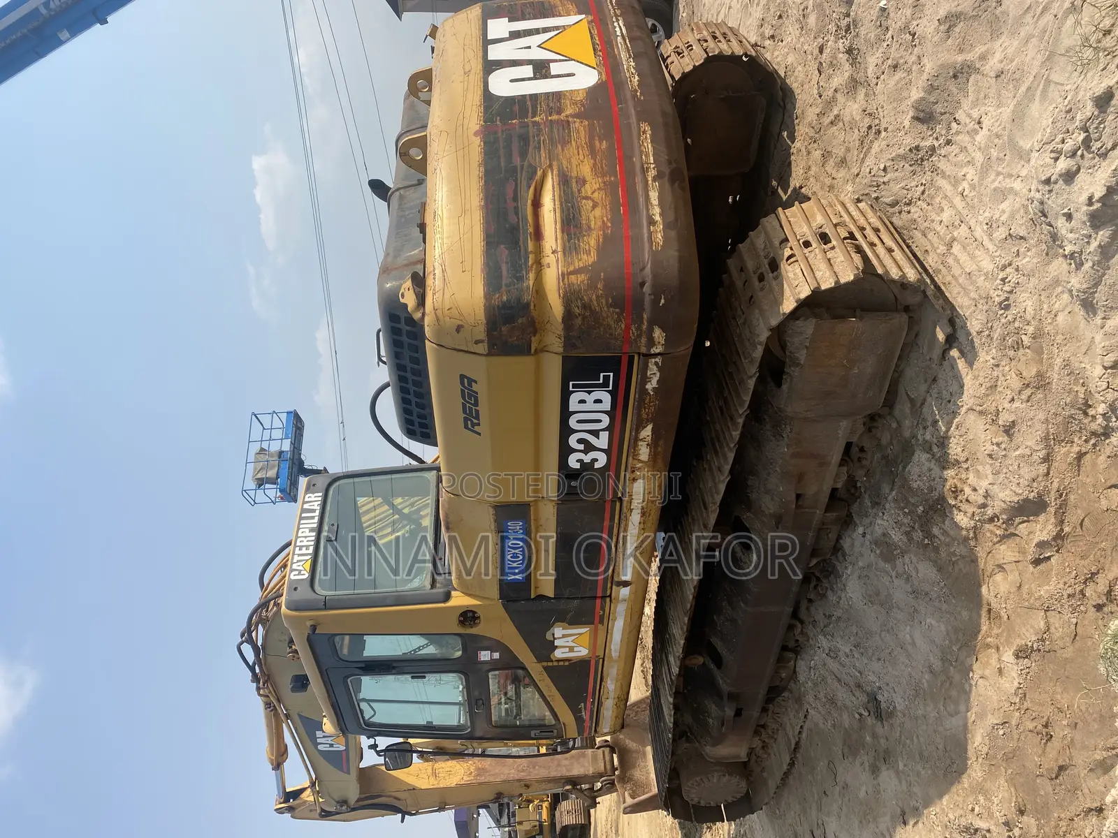 320 BL Excavator