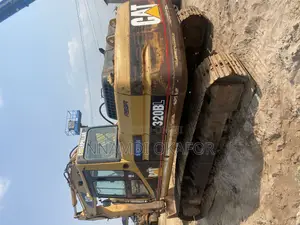 Photo - 320 BL Excavator