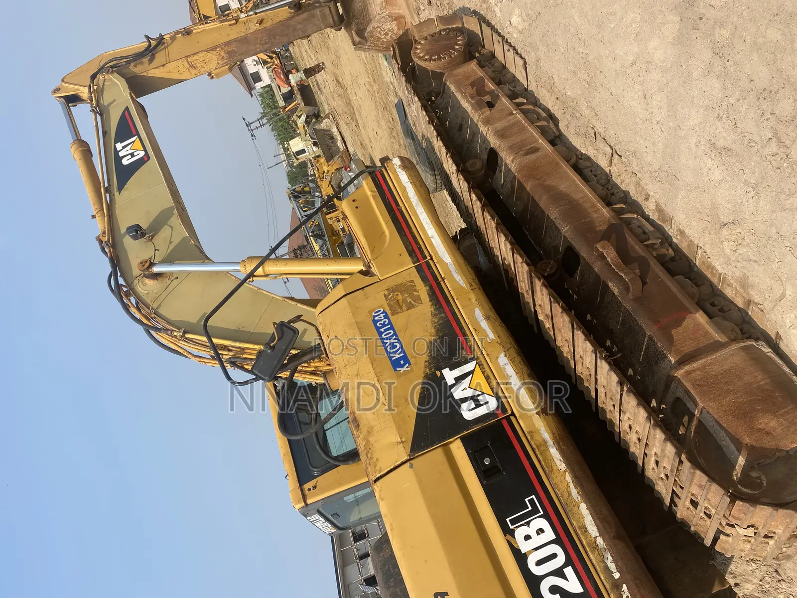 320 BL Excavator