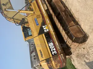 320 BL Excavator