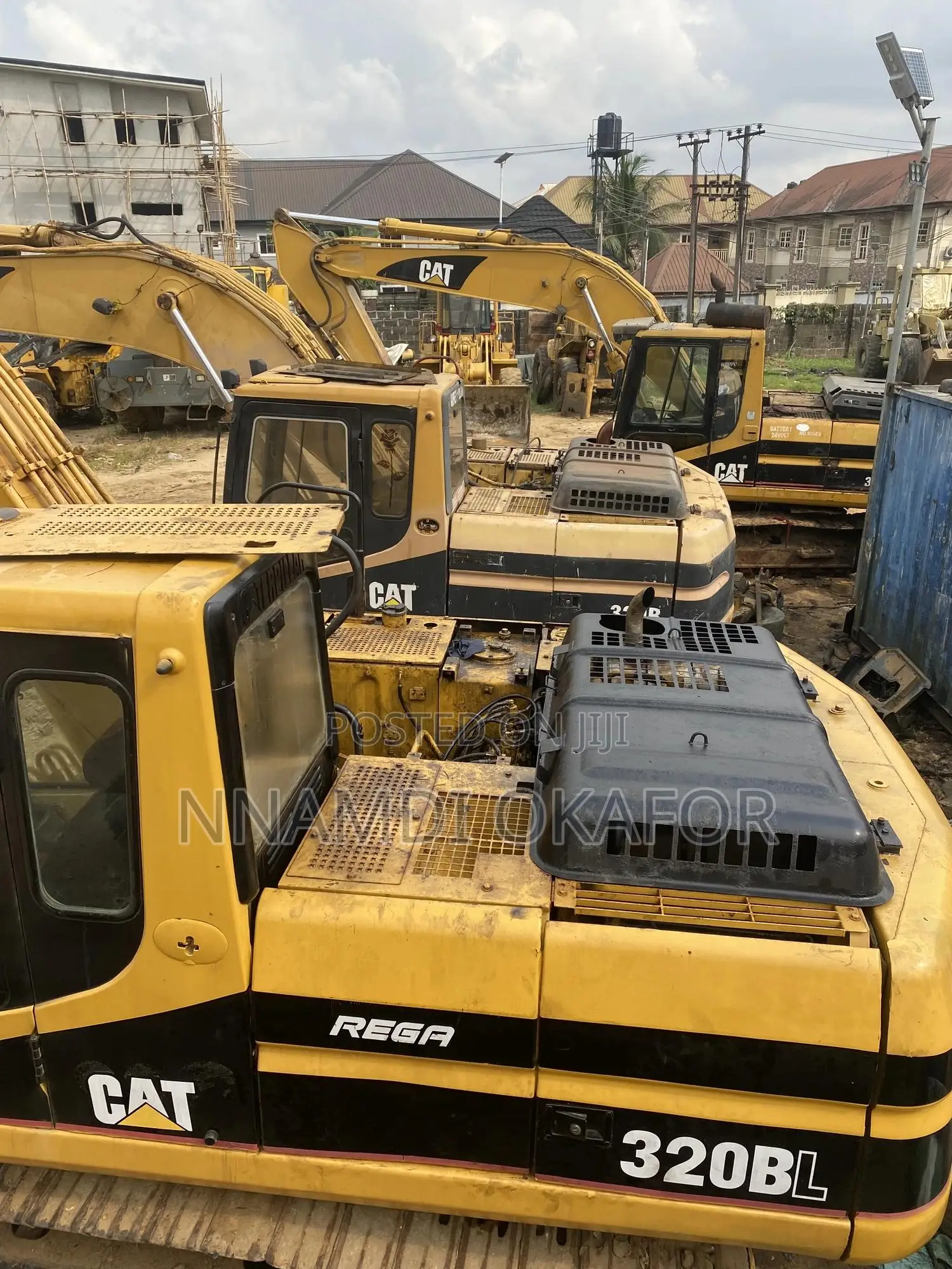320 BL Excavator