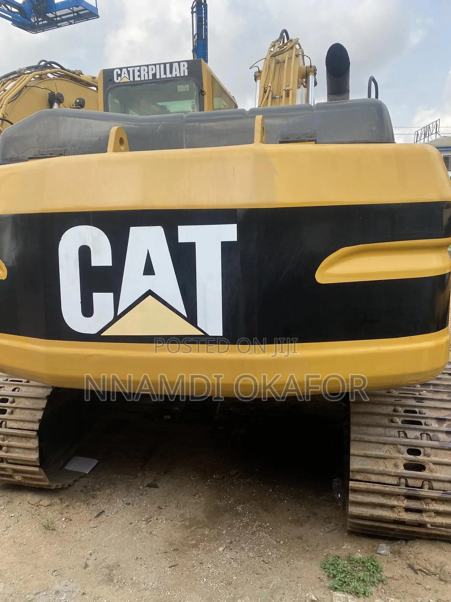 320 BL Excavator