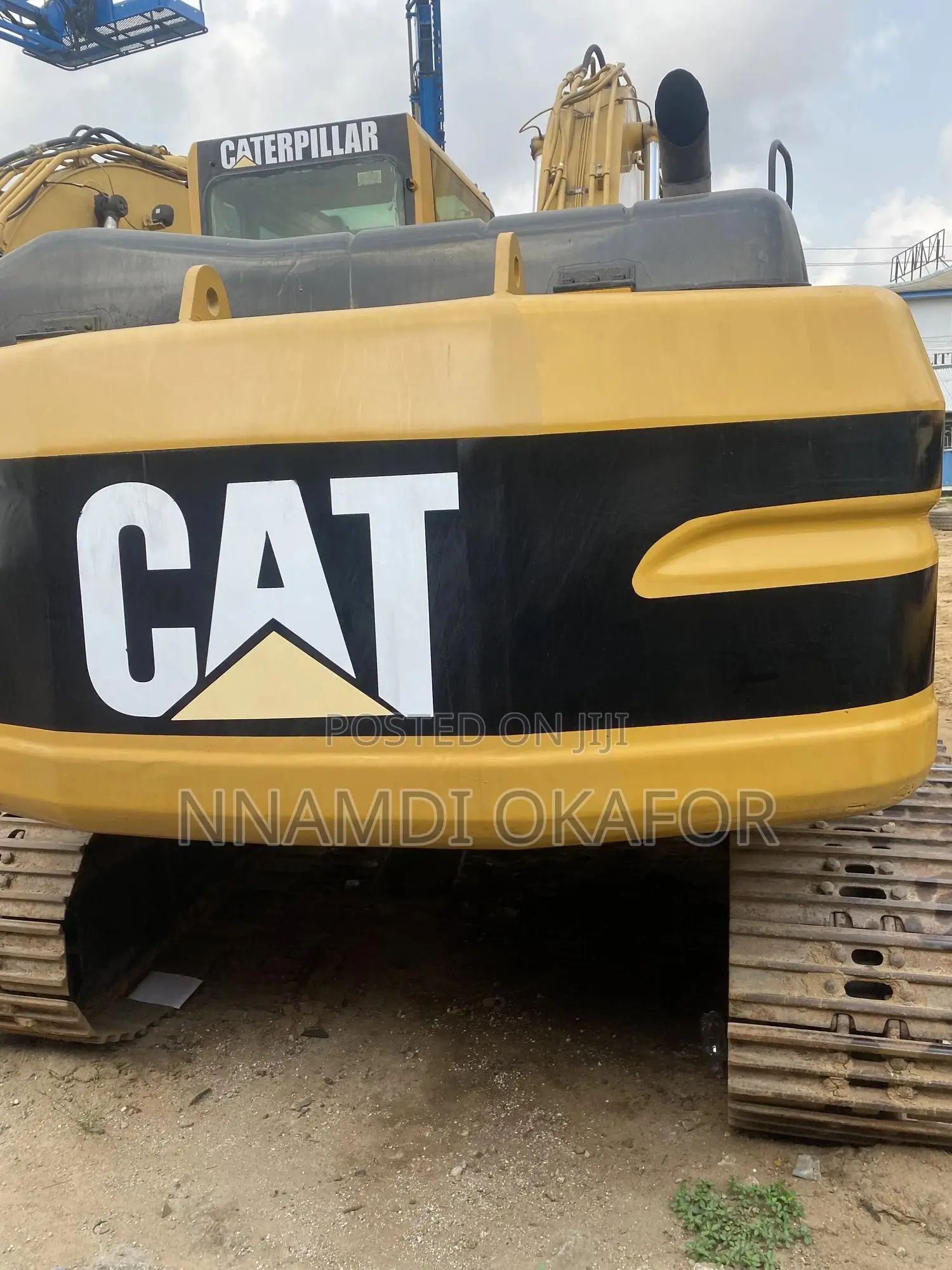 320 BL Excavator