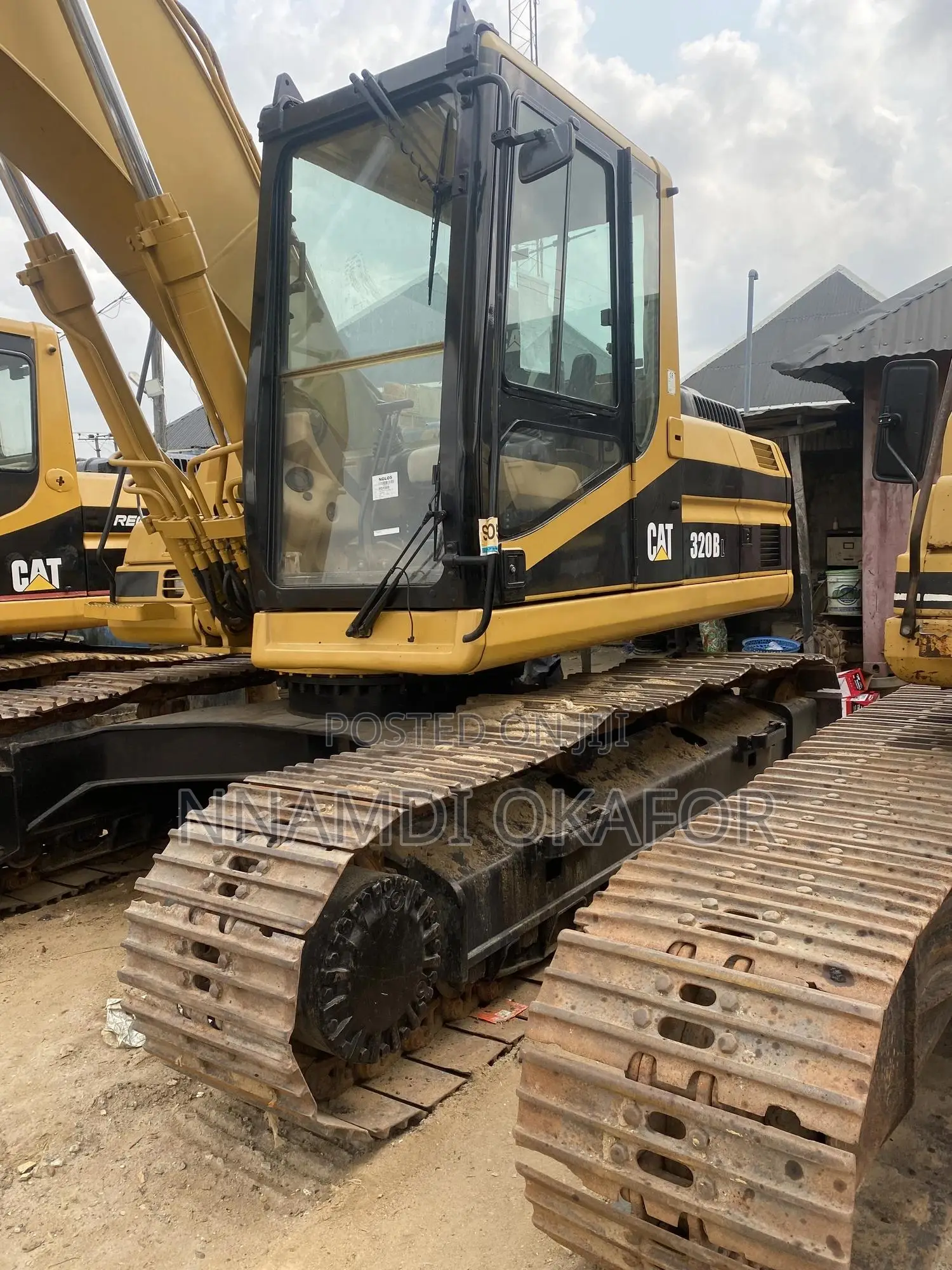320 BL Excavator