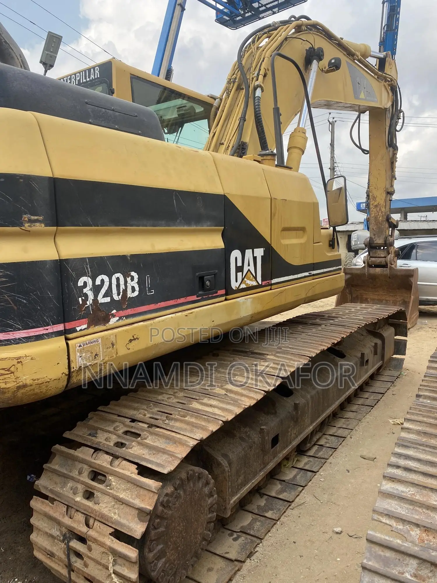 320 BL Excavator