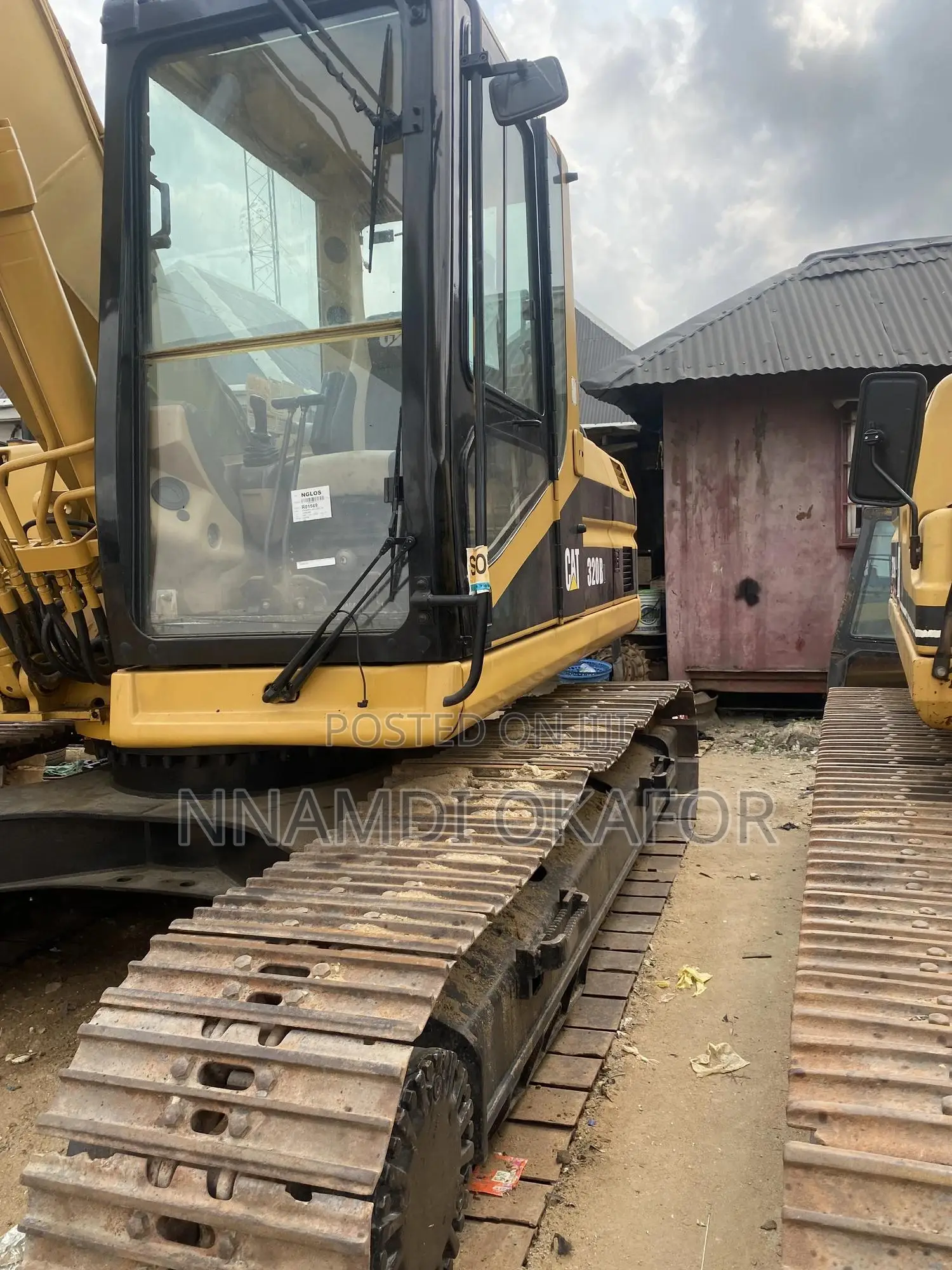 320 BL Excavator