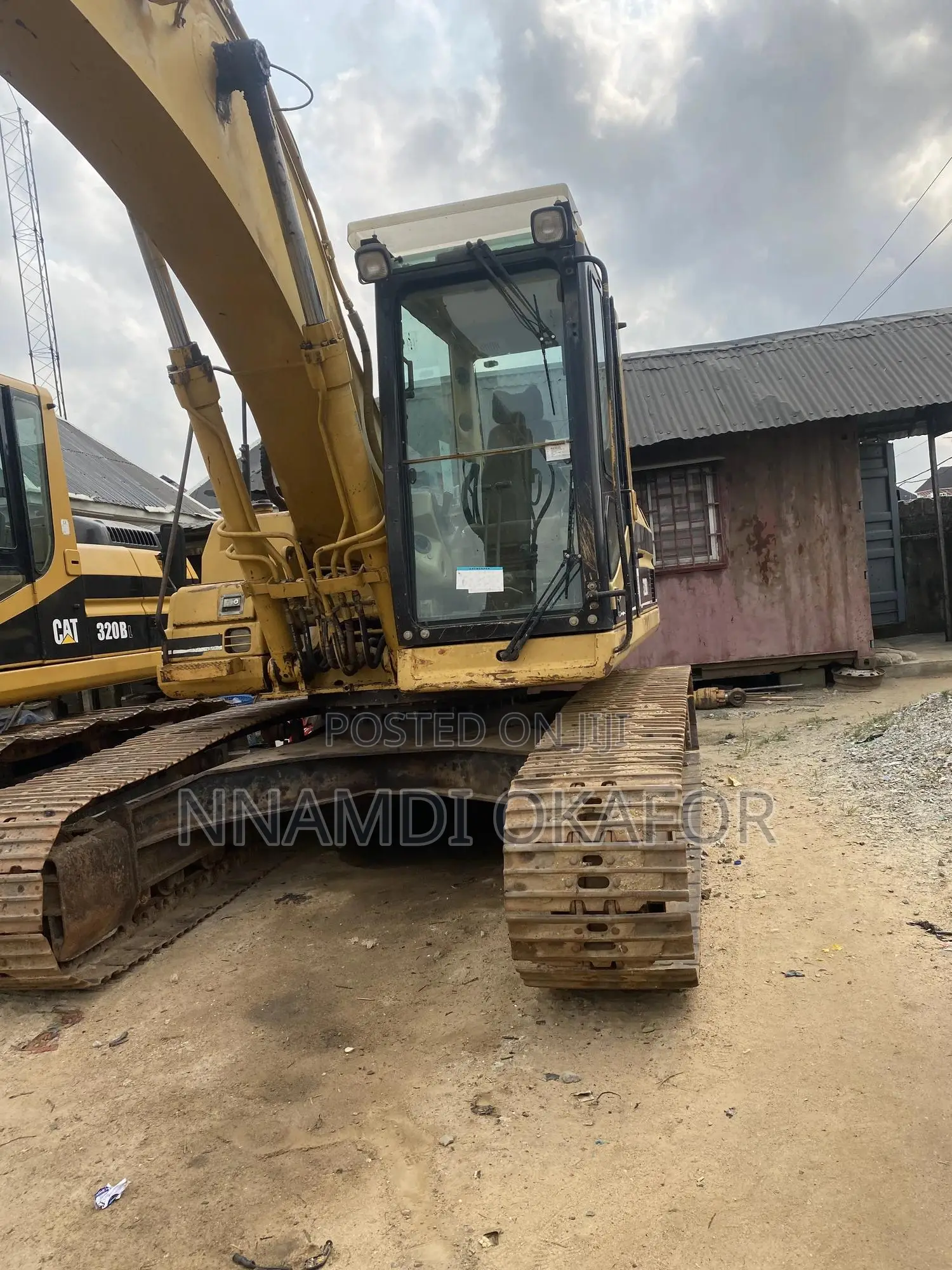 320 BL Excavator