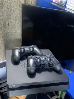 Used Ps4 Slim and Two Pads