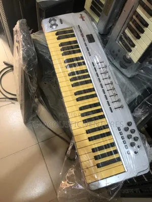 Direct Uk Used Midi Keyboard With Feathers