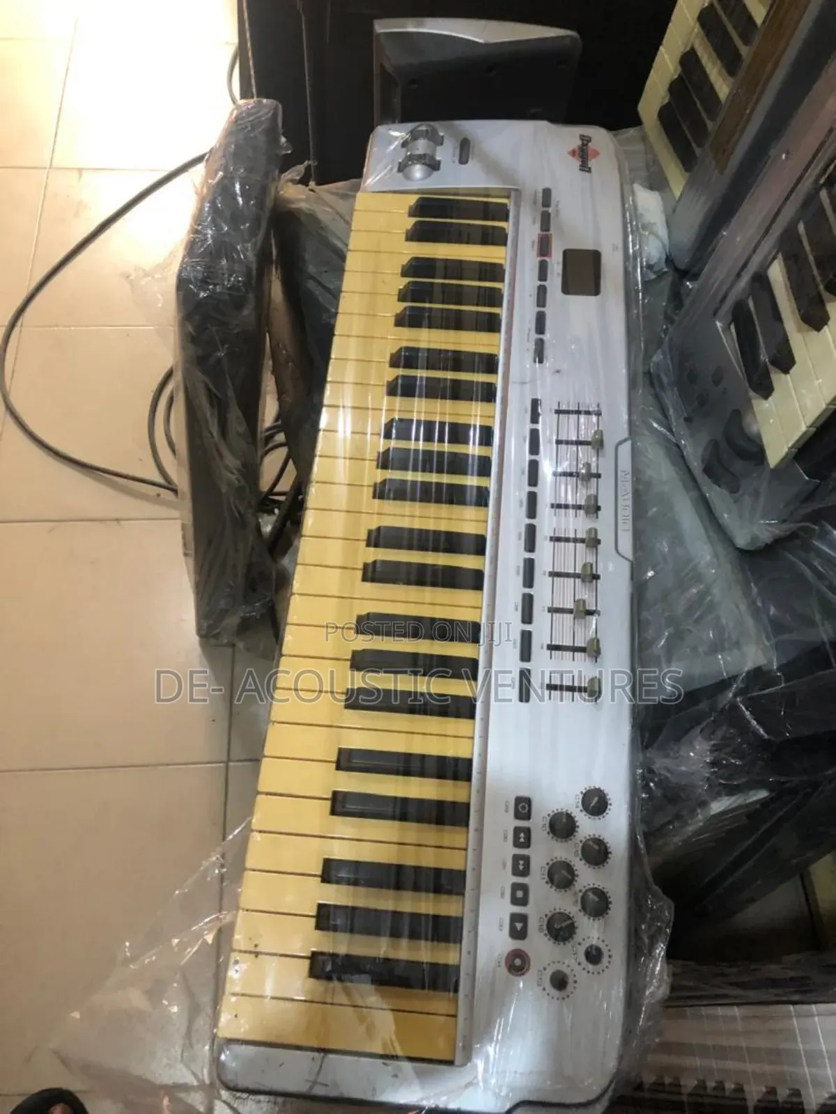 Direct Uk Used Midi Keyboard With Feathers