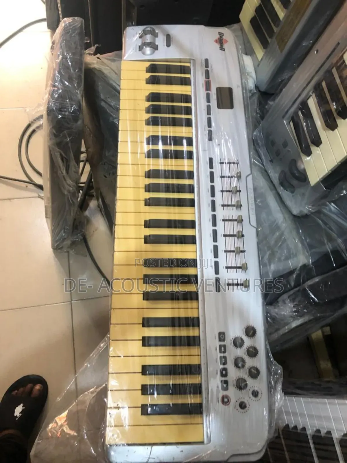 Direct Uk Used Midi Keyboard With Feathers