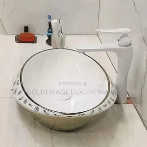 Gold and White Counter Top Basin
