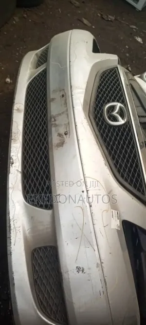 Complete Front Bumper for Mazda MPV 2003 Model