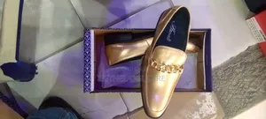 Bran New Gold Shoe