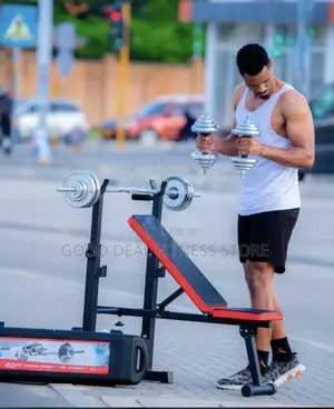 Photo - Flat Weight Bench With 50kg Barbell and Dumbell