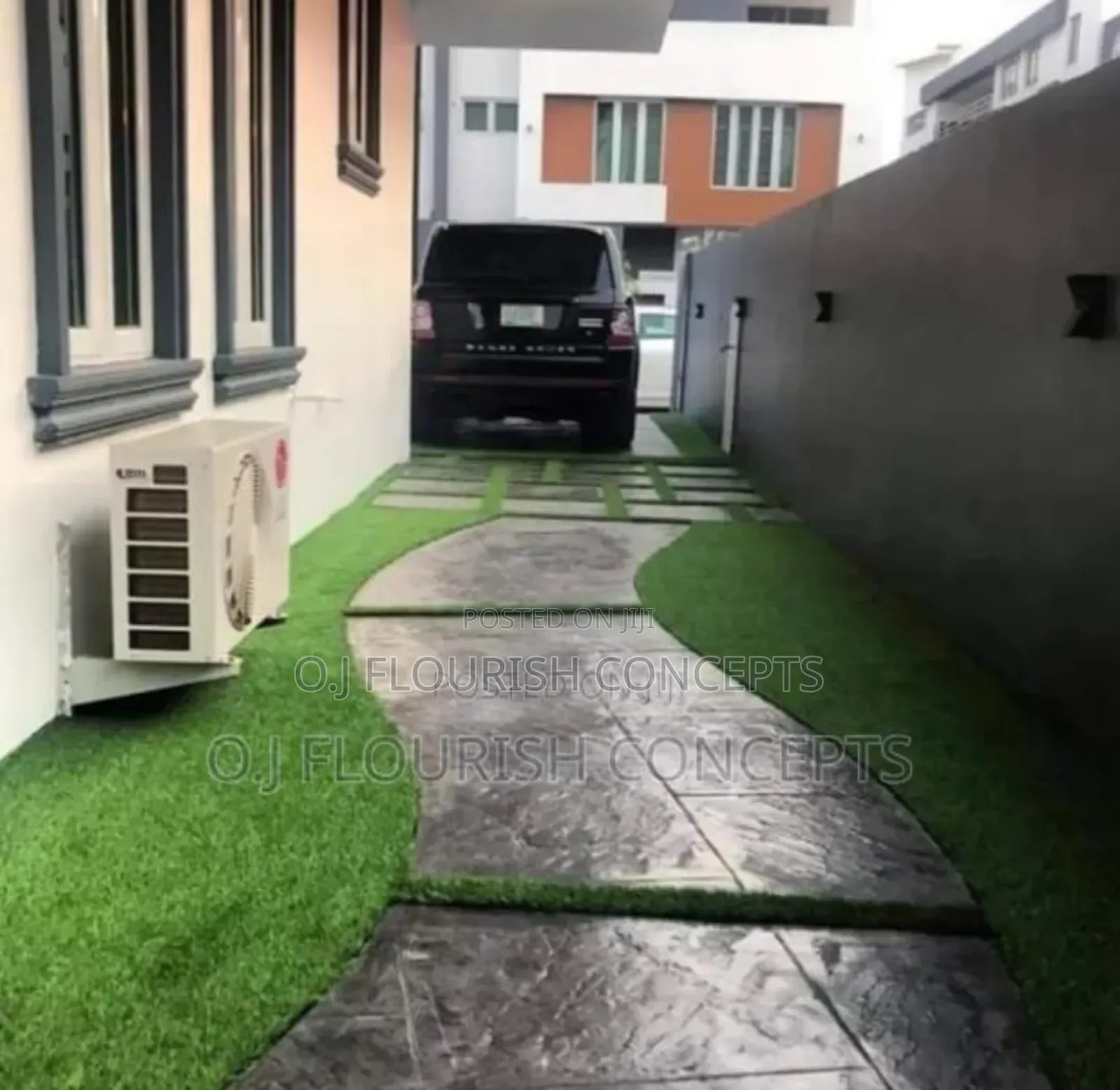 Artificial Grass and Stamped Concrete Flooring