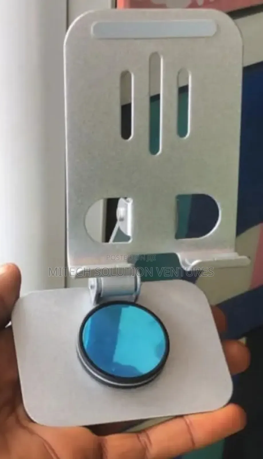 Foldable, Adjustable Metal Stand With a 360-Degrees Rotation