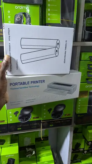 Portable A4 Bluetooth Inkless Printer + 5 Rolls of Paper.