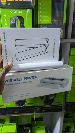 Portable A4 Bluetooth Inkless Printer + 5 Rolls of Paper.