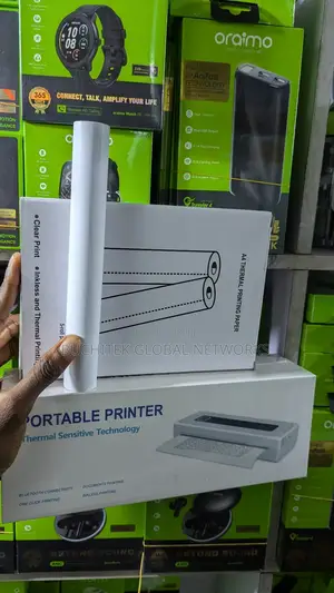 Portable A4 Bluetooth Inkless Printer + 5 Rolls of Paper.