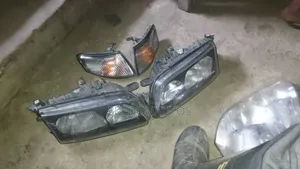 Headlight and Pointer for Mazda 626 Booth 2000 Model