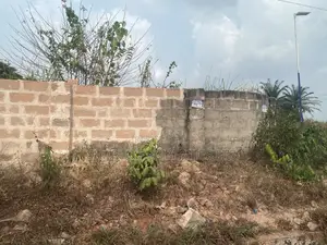 Genuine 100ft by 140ft on a Tarred Road at New Etete Layout