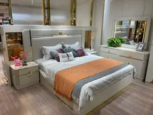 Set of Contemporary Bed With Two Stools and Dresser.