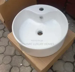 White Round Countertop Wash Hand Basin With Tap Hole