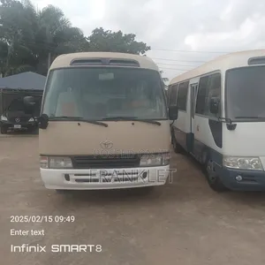 Toyota Coaster 2015 Gold