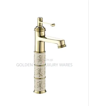 Long Gold and White Basin Tap