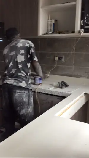 Kitchen Cabinets And Corian Worktop Installation