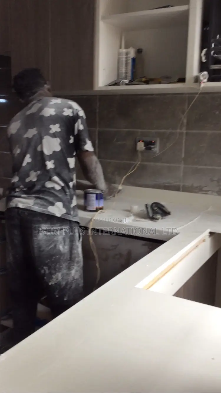 Kitchen Cabinets And Corian Worktop Installation
