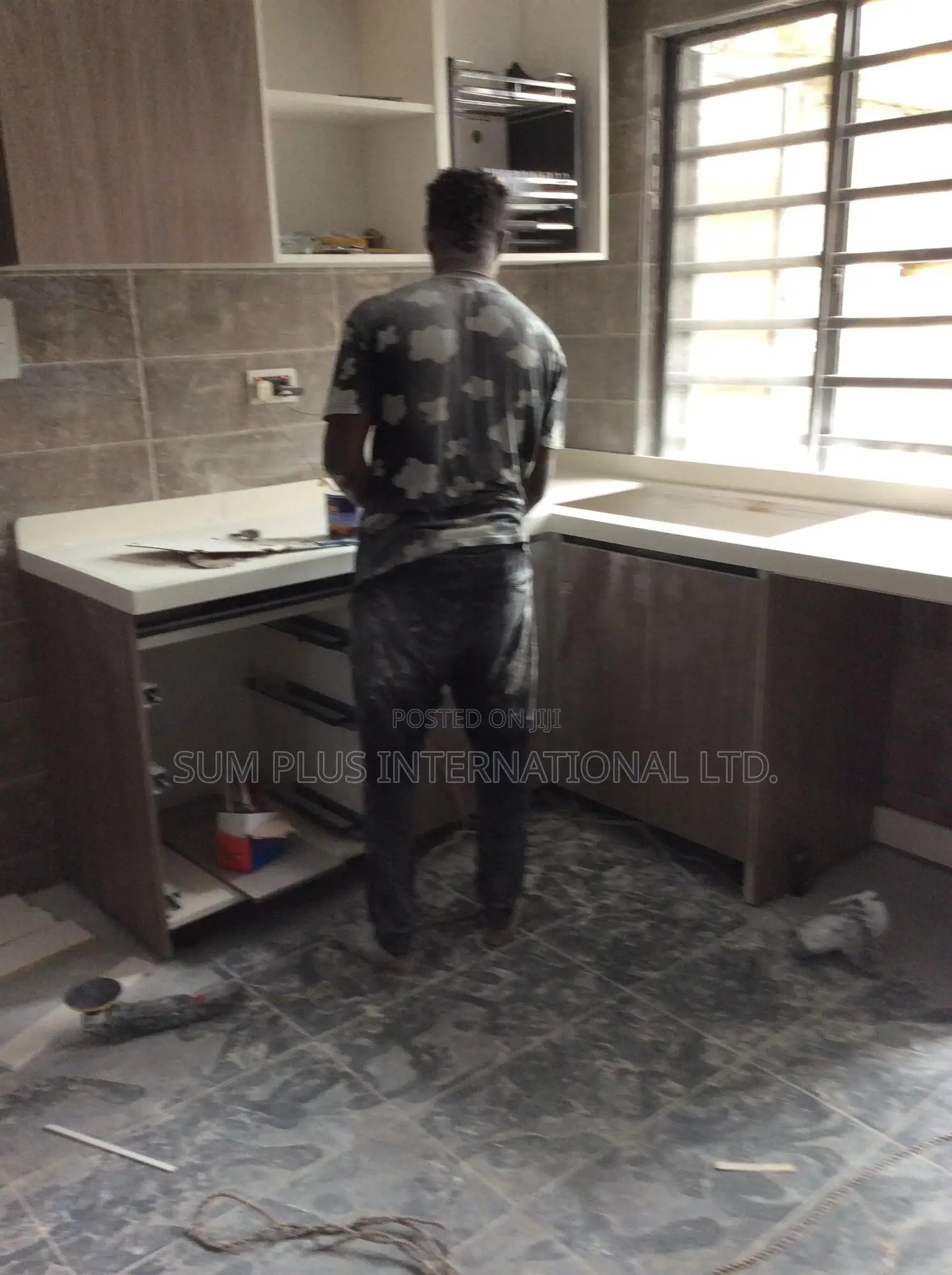 Kitchen Cabinets And Corian Worktop Installation