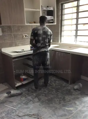Kitchen Cabinets And Corian Worktop Installation