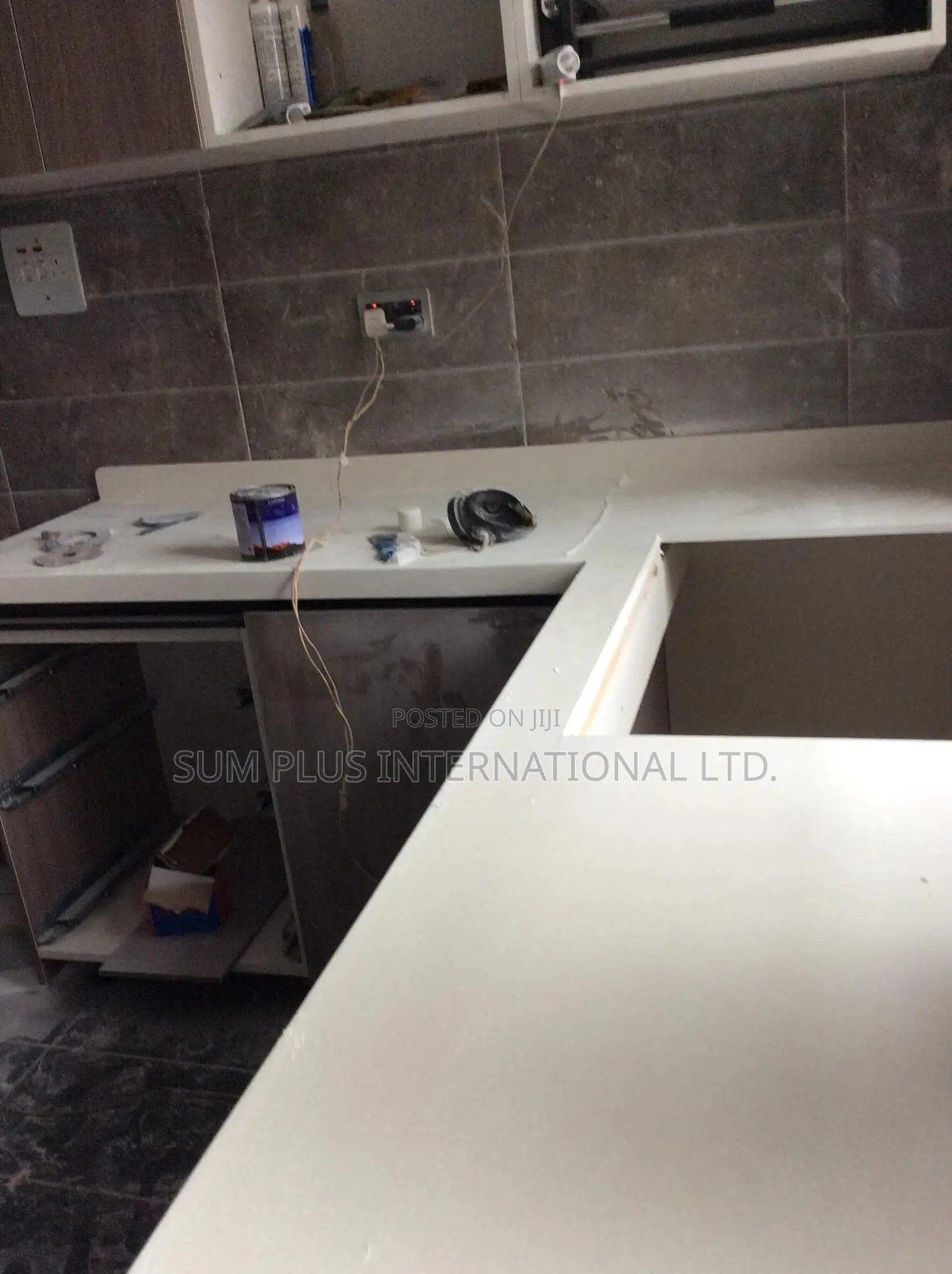 Kitchen Cabinets And Corian Worktop Installation