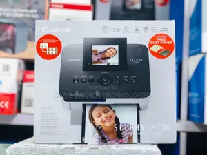 Photo - Canon SELPHY CP1000 - SELPHY Compact Photo Printer