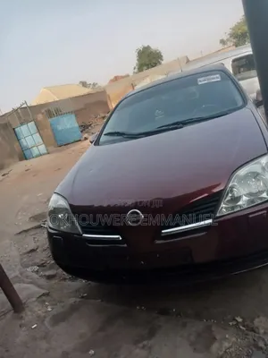 Photo - Nissan Almera 1.6 Comfort 2005 Red