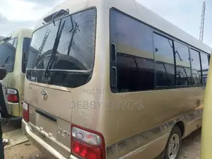 Toyota Coaster 2010 Brown